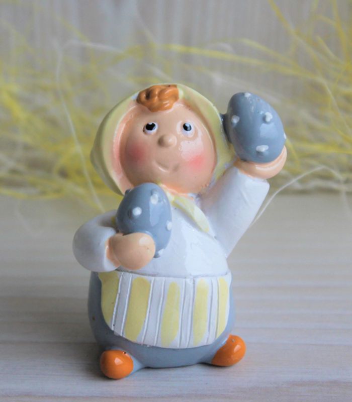 Påskepynt Ester, i gult, med grå egg.